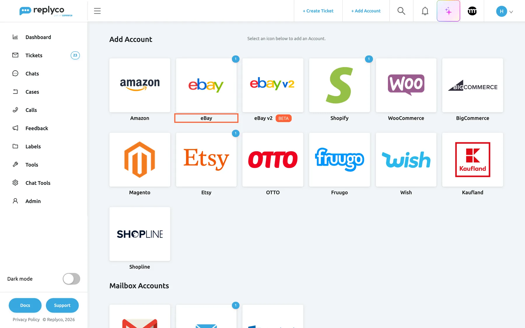 The Add Account page in Replyco, opened with + Add Account in the top bar. The first row of marketplace tiles reads Amazon, eBay, eBay v2 with an orange BETA badge, Shopify, WooCommerce and BigCommerce; Magento, Etsy, OTTO, Fruugo, Wish, Kaufland and Shopline follow, then the Mailbox Accounts heading. The eBay tile, second in the first row, is highlighted and carries a small blue 1 because one eBay account is already connected through it. Selecting it opens the dialog that sends you to eBay to sign in; eBay v2 opens the same dialog for the newer connection.