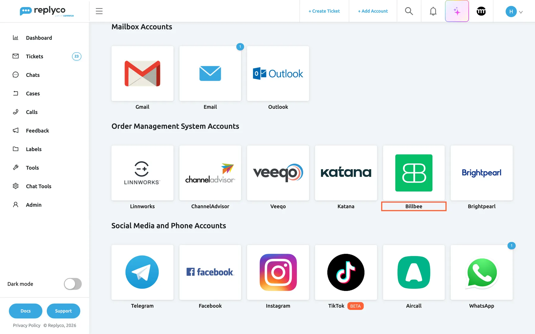 The lower part of the Add Account page in Replyco, opened with + Add Account in the top bar. Under Mailbox Accounts (Gmail, Email, Outlook) comes the group Order Management System Accounts with six tiles: Linnworks, ChannelAdvisor, Veeqo, Katana, Billbee and Brightpearl. The Billbee tile, a green logo, is highlighted; selecting it opens the dialog that connects a Billbee account with its username and API password. The group Social Media and Phone Accounts starts below.