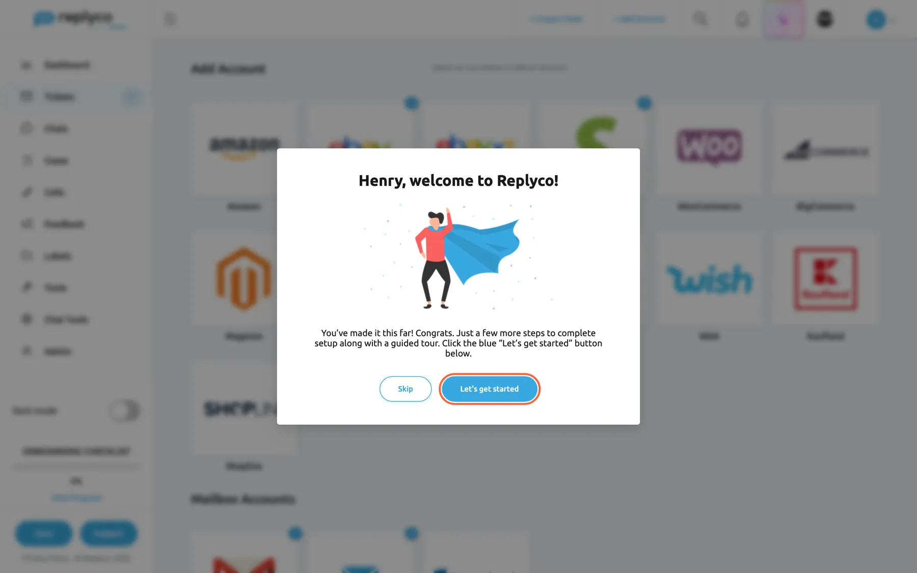 The welcome window Replyco shows a new user, centred over a dimmed screen: the heading "Henry, welcome to Replyco!", an illustration of a person in a blue cape, and the text "You've made it this far! Congrats. Just a few more steps to complete setup along with a guided tour." Below are two buttons, Skip on the left and the blue Let's get started on the right, which is highlighted. Behind the window the Add Account page and the sidebar with the onboarding progress at 0% are blurred. Let's get started opens the onboarding checklist.