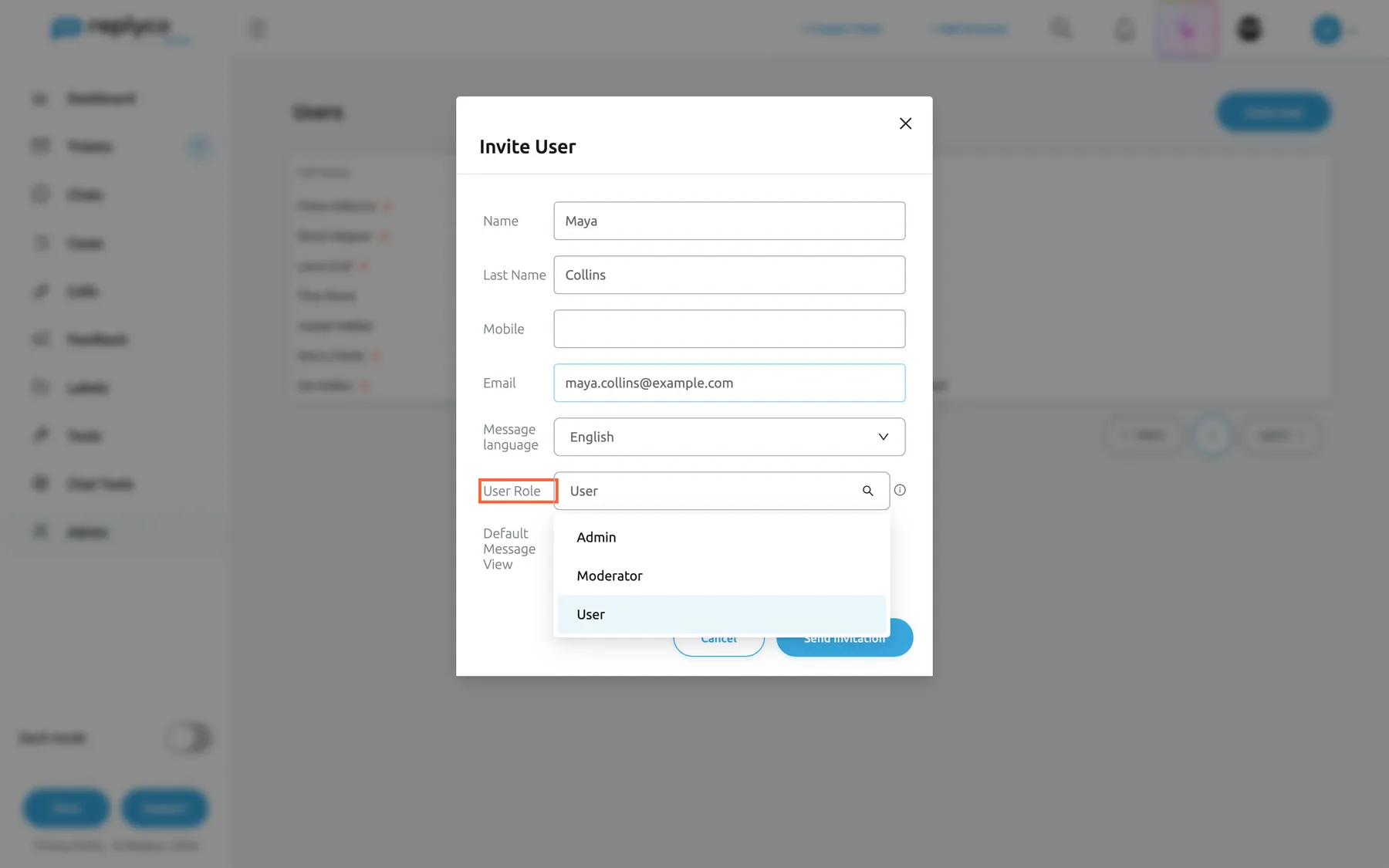 The Invite User form in Replyco, filled in with Name Maya, Last Name Collins and Email maya.collins@example.com; Mobile is empty and Message language shows English. The label User Role is highlighted and its drop-down is open, offering Admin, Moderator and User; User, the preset for a new colleague, is selected. An information icon beside the drop-down explains the roles. The open list covers the Default Message View switch and part of the Cancel and Send Invitation buttons.