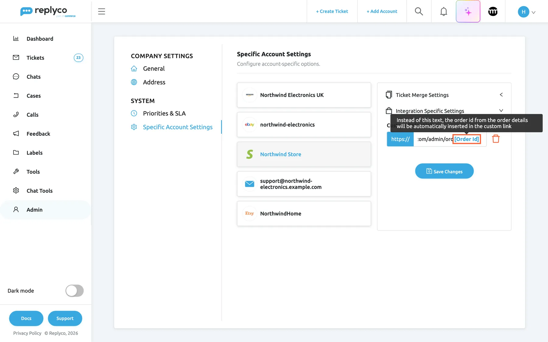 The Specific Account Settings tab with the Shopify account Northwind Store selected and Integration Specific Settings expanded. The Custom Order Link box starts with a fixed https:// and holds the typed address northwind-store.example.com/admin/orders/, of which the end is visible. After the address, the blue [Order Id] text is highlighted, and its tooltip reads "Instead of this text, the order id from the order details will be automatically inserted in the custom link". A red bin icon beside the box clears the link. Save Changes is below.