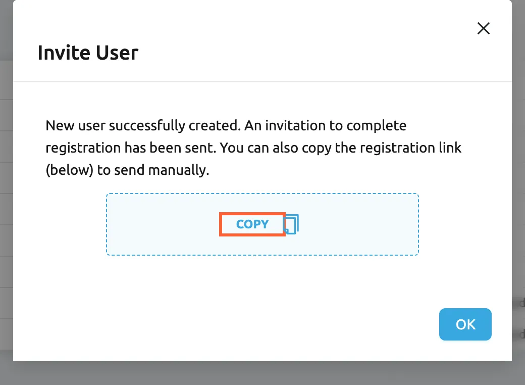 The Invite User dialog after Send Invitation was confirmed. It reads: "New user successfully created. An invitation to complete registration has been sent. You can also copy the registration link (below) to send manually." Below it, in a dashed box, the label Copy, shown in capitals, is highlighted next to a copy icon; selecting it copies the registration link for Maya Collins. The OK button at the bottom right closes the dialog.