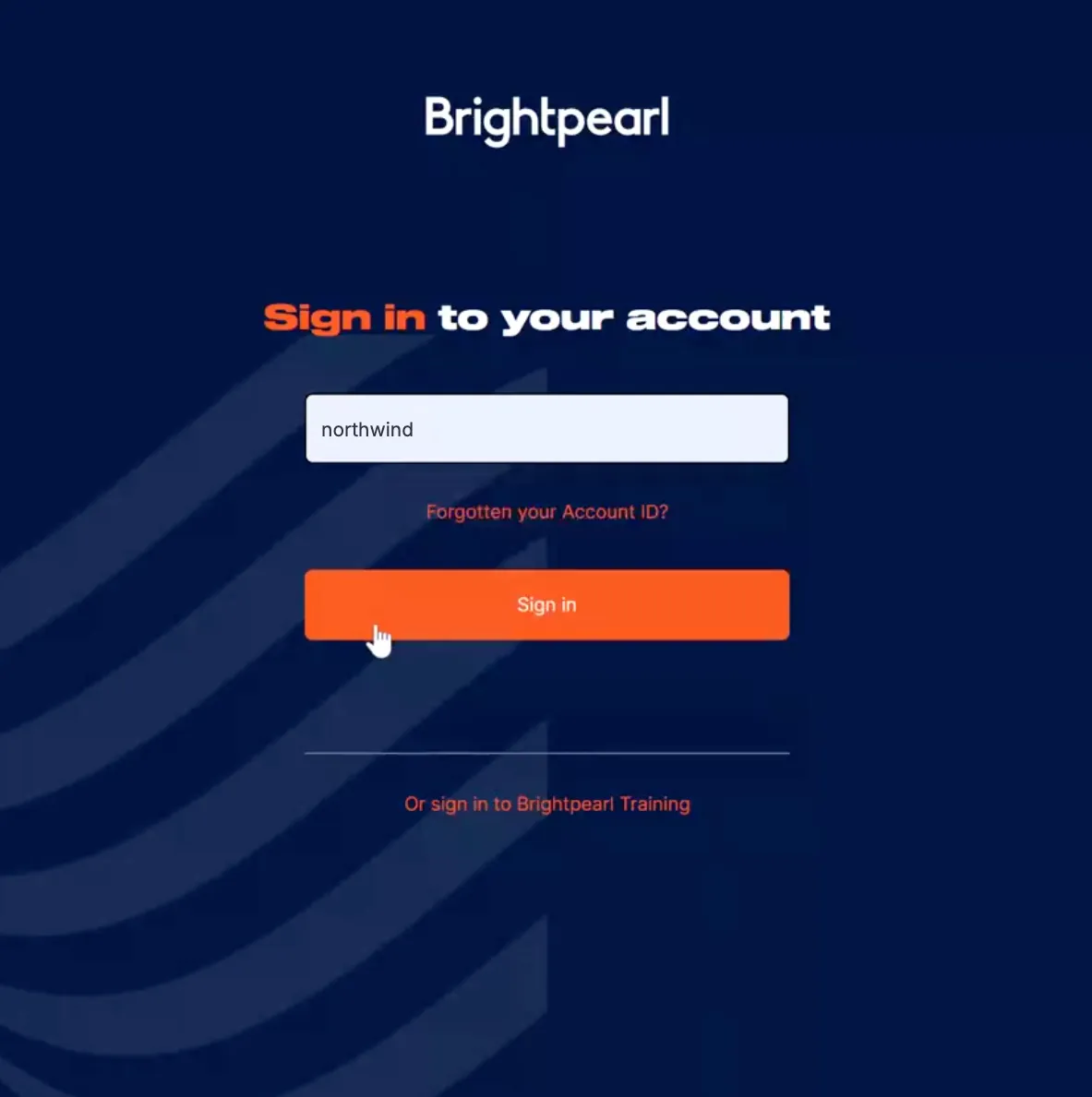 Brightpearl's sign-in page on a dark blue background, which opens in a new browser tab after you select Authorize in Replyco. Under the Brightpearl logo, the heading reads "Sign in to your account". The single field holds the Brightpearl account ID, with the link "Forgotten your Account ID?" below it. The orange "Sign in" button, with the pointer on it, continues to Brightpearl's login; "Or sign in to Brightpearl Training" is at the bottom.