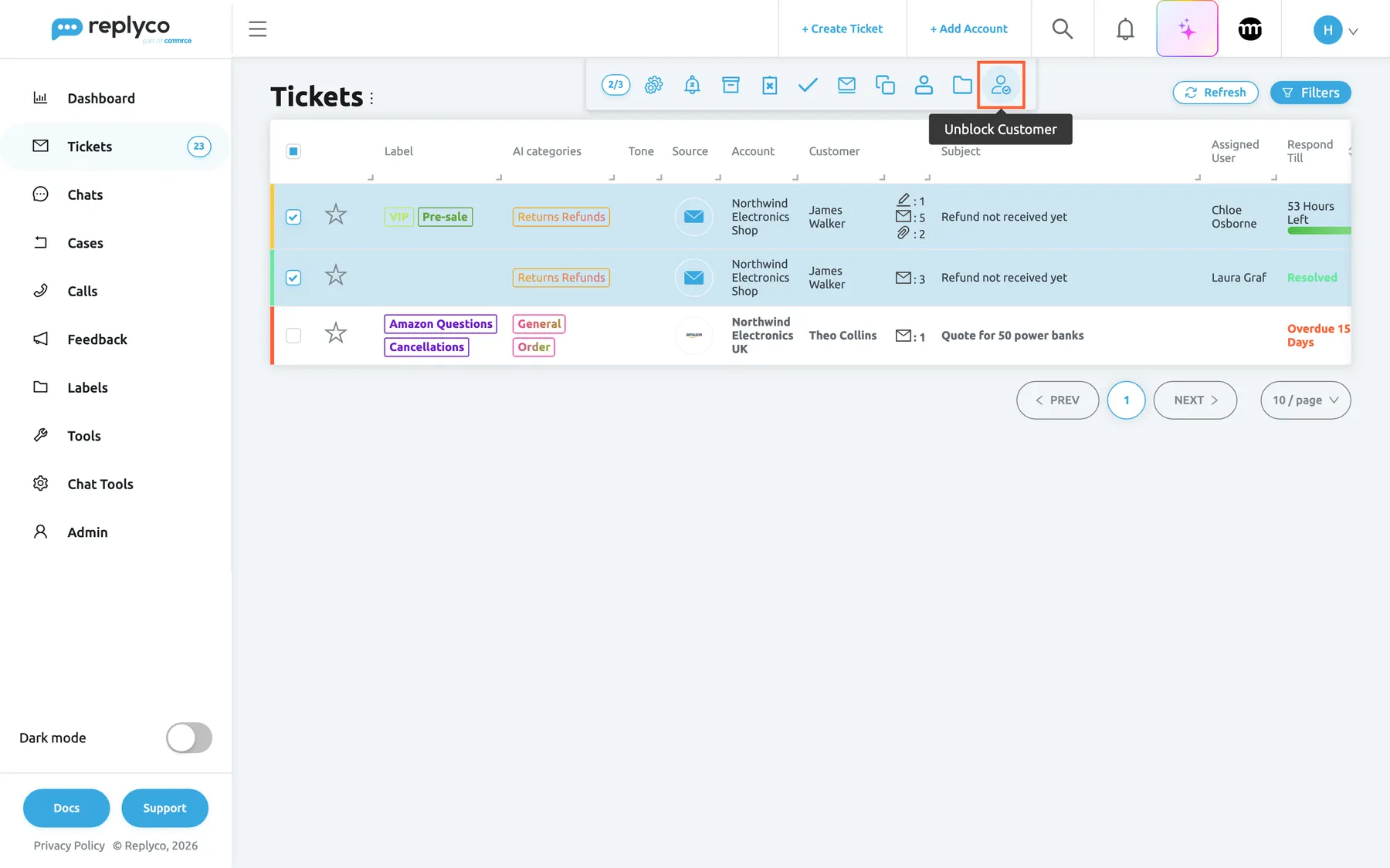 The Blocked ticket list in Replyco with both "Refund not received yet" tickets of James Walker ticked and shaded blue. The bulk action bar at the top shows the counter 2/3 and the icons Run Rules, Snooze, Archive, Mark Unresolved, Mark Resolved, Mark Unread, Merge Tickets, Assign User, Assign Labels and, last, Unblock Customer, which takes the place of Block Customer on this view. Unblock Customer is highlighted and its tooltip is shown. Selecting it unblocks James Walker at once, without a confirmation.