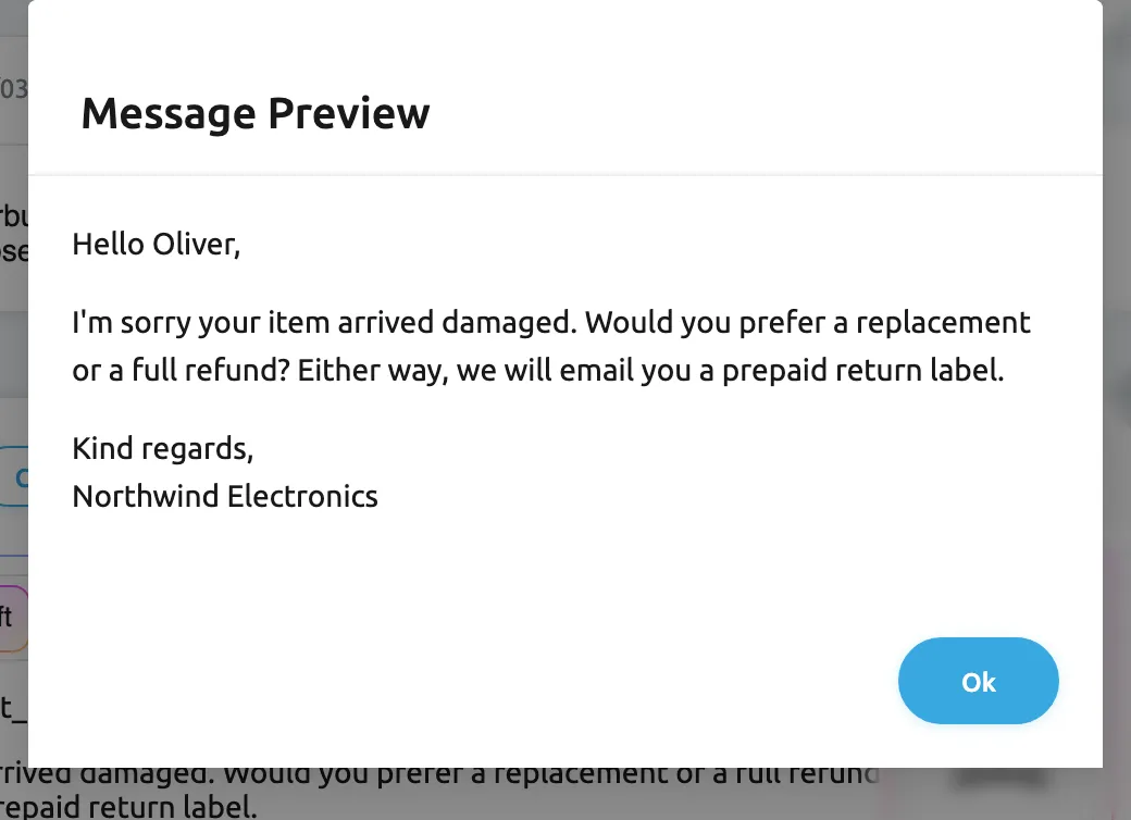 The Message Preview dialog, highlighted, opened with the Preview button under the reply editor of ticket #32537. The editor holds the template "Damaged item – refund or replacement?" with the placeholder #customer_first_name#; the preview shows the message as the customer will receive it, with the placeholder filled in from the ticket: "Hello Oliver, I'm sorry your item arrived damaged. Would you prefer a replacement or a full refund? Either way, we will email you a prepaid return label. Kind regards, Northwind Electronics". The Ok button at the bottom right closes the dialog without sending anything.